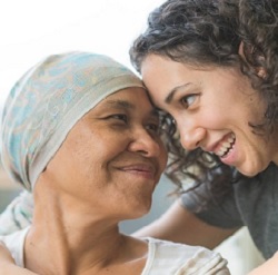Cancer patient smiling at her daughter