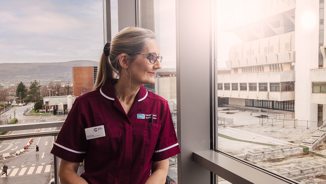 Ruth Boyd looking out of a window